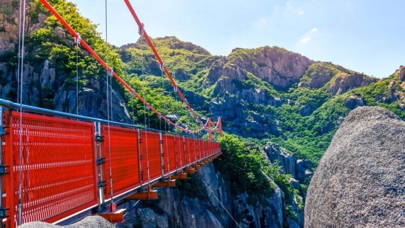 Guide to hiking the Wolchulsan National Park in South Korea. Check out the famous Cloud Bridge that links the two peaks of this National Park. #travel #hiking