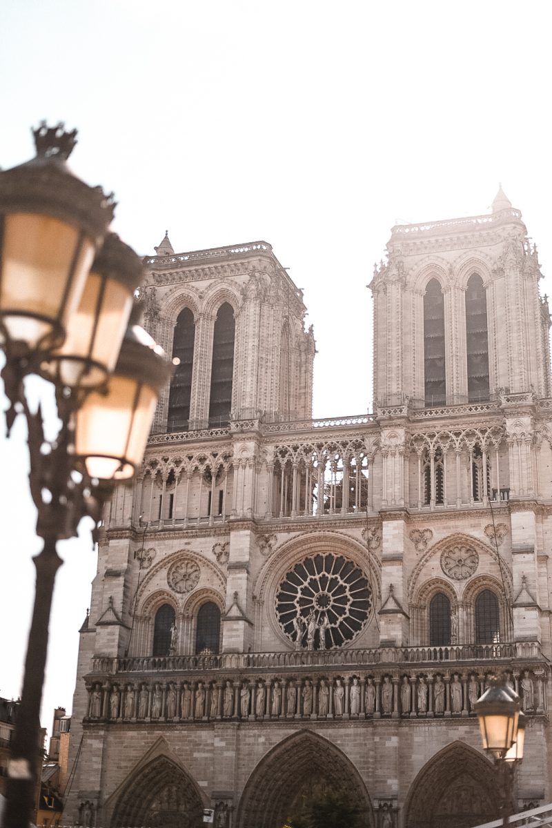 Photo of Notre Dame at sunrise. One of the most popular sites in Paris, France.