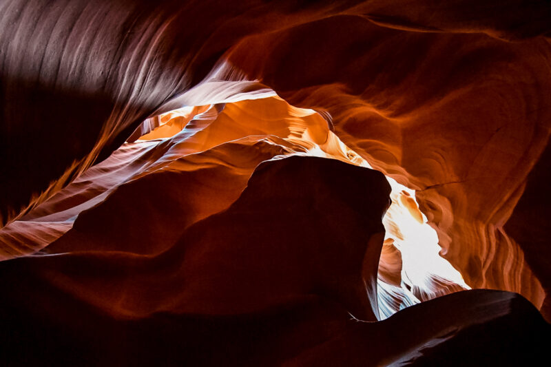 Learn about visiting Antelope Canyon. Should you visit the upper or lower canyon? Can you go on your own or do you have to book a tour? When should you book a tour? Everything you need to know and more about this popular attraction in Arizona! #arizona #slotcanyons #antelopecanyon #explore
