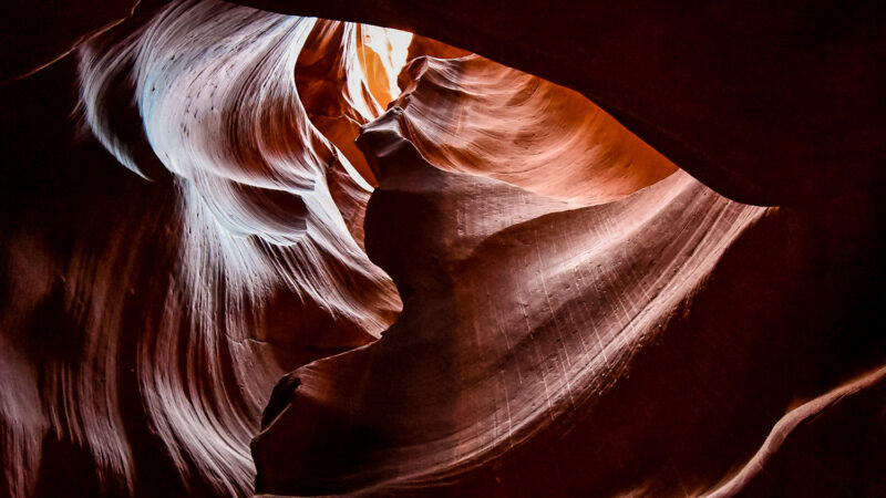 Learn about visiting Antelope Canyon. Should you visit the upper or lower canyon? Can you go on your own or do you have to book a tour? When should you book a tour? Everything you need to know and more about this popular attraction in Arizona! #arizona #slotcanyons #antelopecanyon #explore