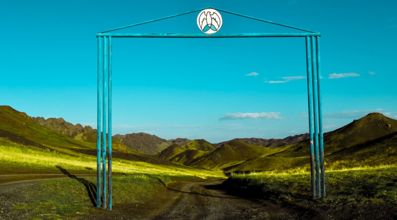 The entrance gate to Eagle Valley. Hiking Eagle Valley is an option for all skill levels. The start of this Mongolian hike is easy, and gradually increases in difficulty allowing adventurers to turn back whenever the trail becomes too difficult. Learn about hiking in Mongolia's Eagle Valley, and the wildlife you can see while there! #mongolia #eaglevalley #hiking