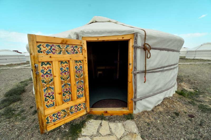 The beautiful doors of some Gers. Learn about what it is like to stay at a Mongolian Ger Camp. Learn about the what a ger is (the Mongolian yurt) and what to expect when staying at a Ger Camp! #mongolia #ger #gercamp #travelmongolia