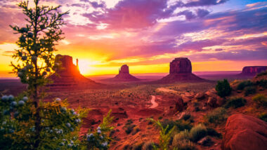 Sunrise at Monument Valley. Monument Valley has two famous spots: sunrise of Mitten Buttes and Merrick Buttes, and then sunset at the famous Forrest Gump movie scene location. Learn about what to expect visiting Monument Valley, and how to capture the best photos while visiting! #monumentvalley #buttes #desert