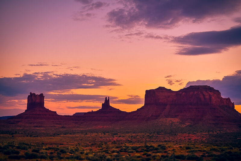 Rock formations at Monument Valley. Monument Valley has two famous spots: sunrise of Mitten Buttes and Merrick Buttes, and then sunset at the famous Forrest Gump movie scene location. Learn about what to expect visiting Monument Valley, and how to capture the best photos while visiting! #monumentvalley #buttes #desert