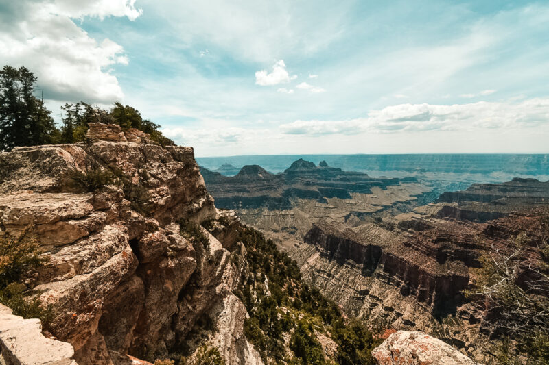 View from Angels Bright at the North Rim of the Grand Canyon. Looking to visit the Grand Canyon? The Grand Canyon should be on any travelers bucket list. If you want to see amazing views of the Grand Canyon, but with far fewer people then learn about exploring the North Rim of the Grand Canyon. #grandcanyon #nationalpark #hike