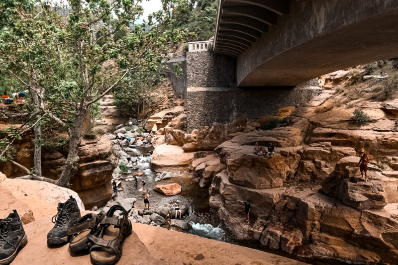 Bridge over Slide Rock State Park. Looking for things to do in Sedona, Arizona? Then check out one of the world's natural water slides. Slide Rock State Park offers an escape from the Arizona heat with a chance to dip in the chilly water - or slide down the smooth rocks. #arizona #sliderock #sedona 