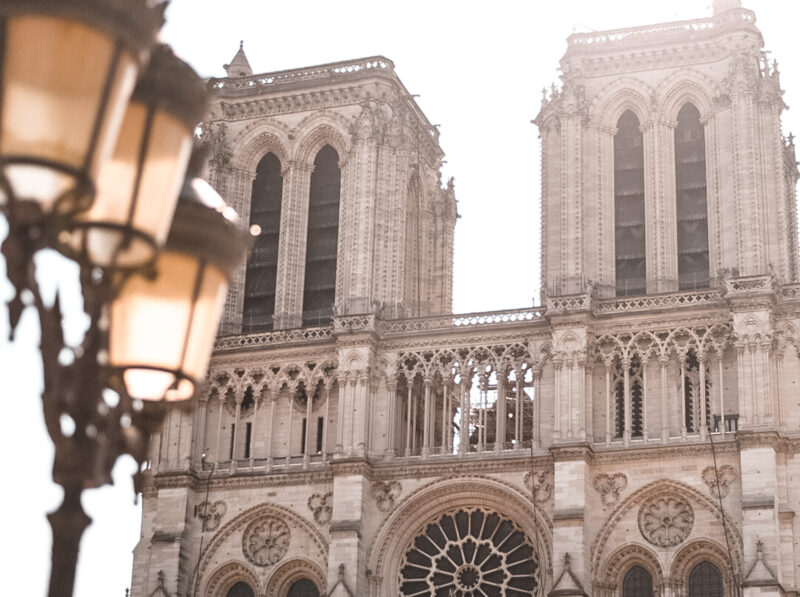 Photo of Notre Dame at sunrise. One of the most popular sites in Paris, France.