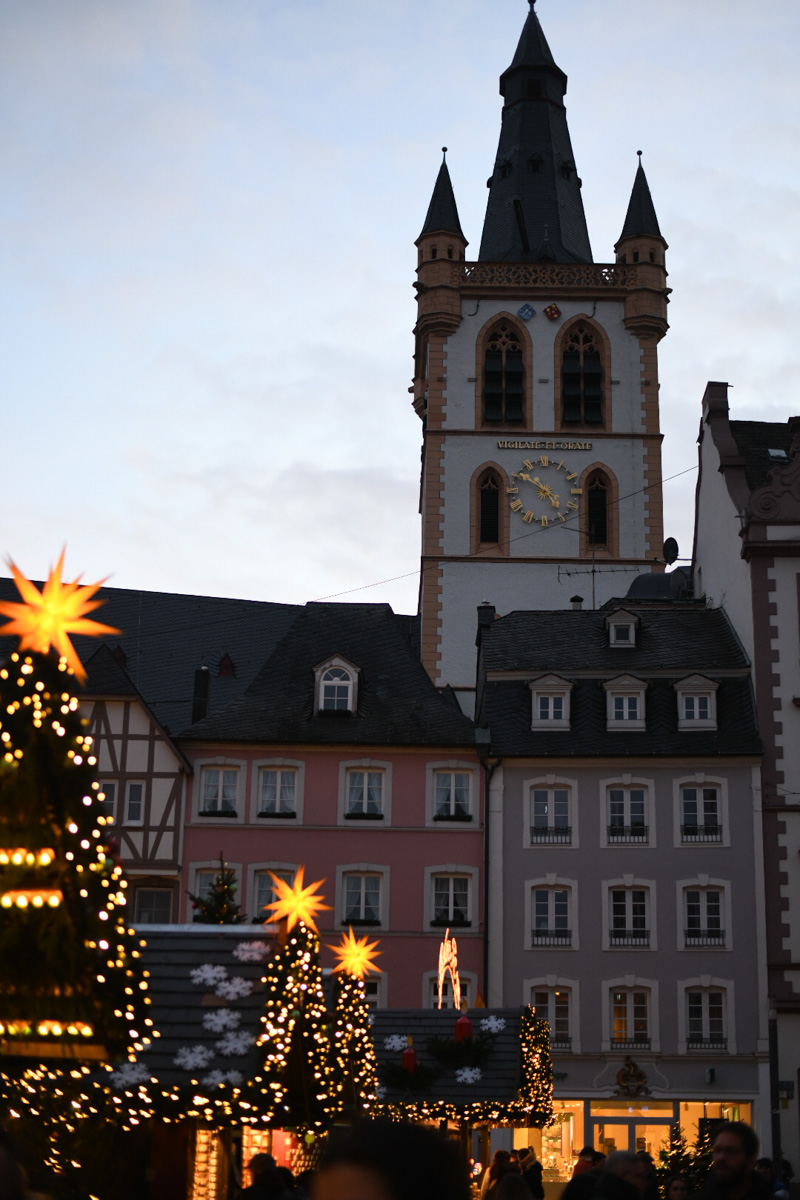 Warm Glühwein and Reibekuchen served at Trier’s festive Christmas stalls in Hauptmarkt.