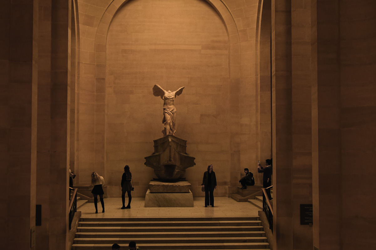 Behold the majestic Winged Victory of Samothrace, a timeless symbol of triumph and beauty in the heart of the Louvre